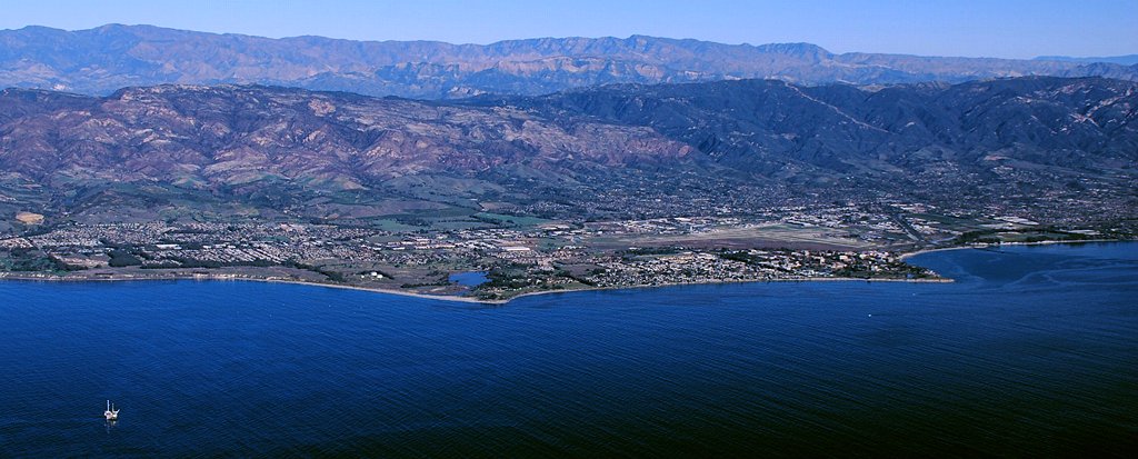 Aerial view of Goleta and the Santa Barbara coastline with the Santa Ynez Mountains behind