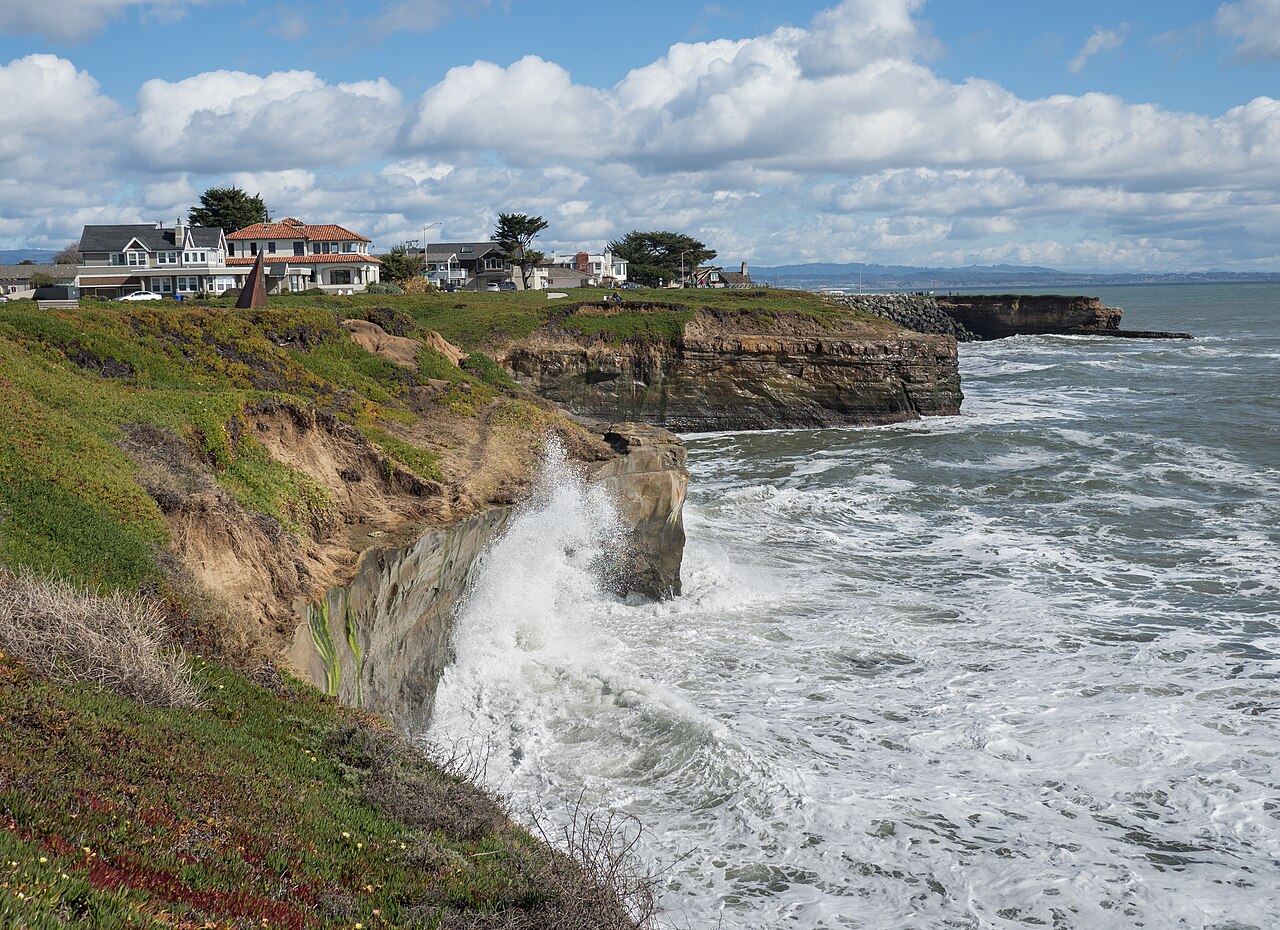 Waves breaking on the cliffs of the Santa Cruz coastline, California