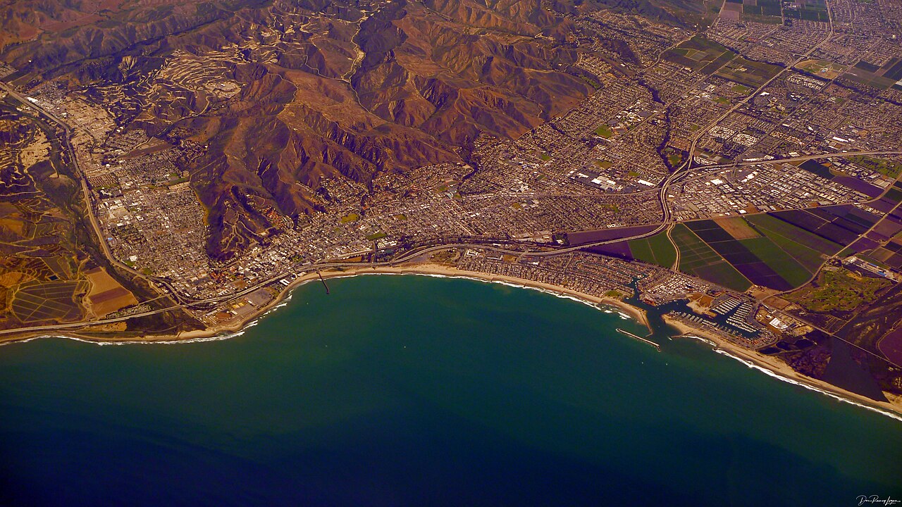 Aerial view of the city of Ventura, California between the hills and the Pacific coast